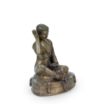 Picture of A bronze statue of Milarepa seated in a meditative pose