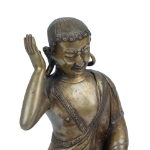 Picture of A bronze statue of Milarepa seated in a meditative pose
