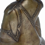 Picture of A bronze statue of Milarepa seated in a meditative pose