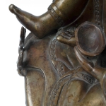Picture of A bronze statue of Milarepa seated in a meditative pose