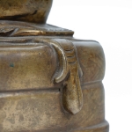 Picture of A bronze statue of Milarepa seated in a meditative pose
